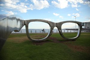 Michael Elions polycarbonate artwork of Sunglasses, dedicated to Nelson Mandela, at Sea Point, Cape Town. The piece controversially co-funded by Ray-Ban is considered to be in poor taste by some. Image Jayne Haywood. 21.03.15